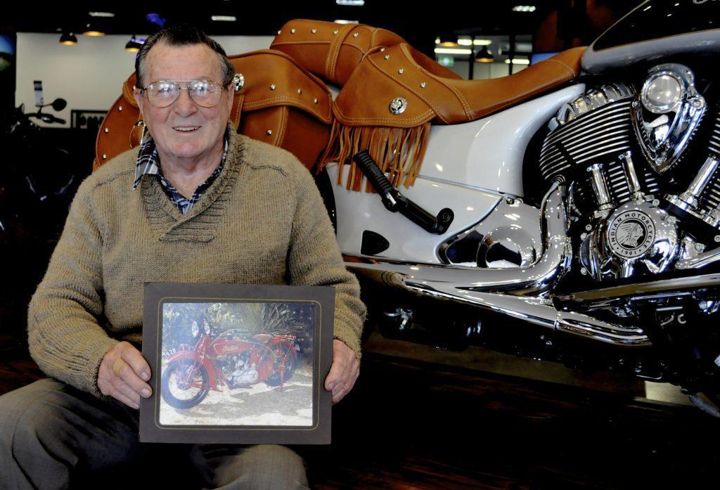 CAPTION: First-day crowd included long-time (50-odd years!) Vintage Motorcycle Club of WA member Spencer Sheffield. Spencer knows a thing or two about Indians. That photo on his lap is his 1928 Indian Scout (born as a 750 but now a 935cc). It lives in his lounge room. Fair enough, too. 