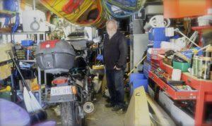 CAPTION: There's nothing quite like a man in his shed. Kurt admires his life-saving MZ660.
